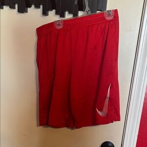 Nike Red Mesh Sports Shorts with White Swoosh